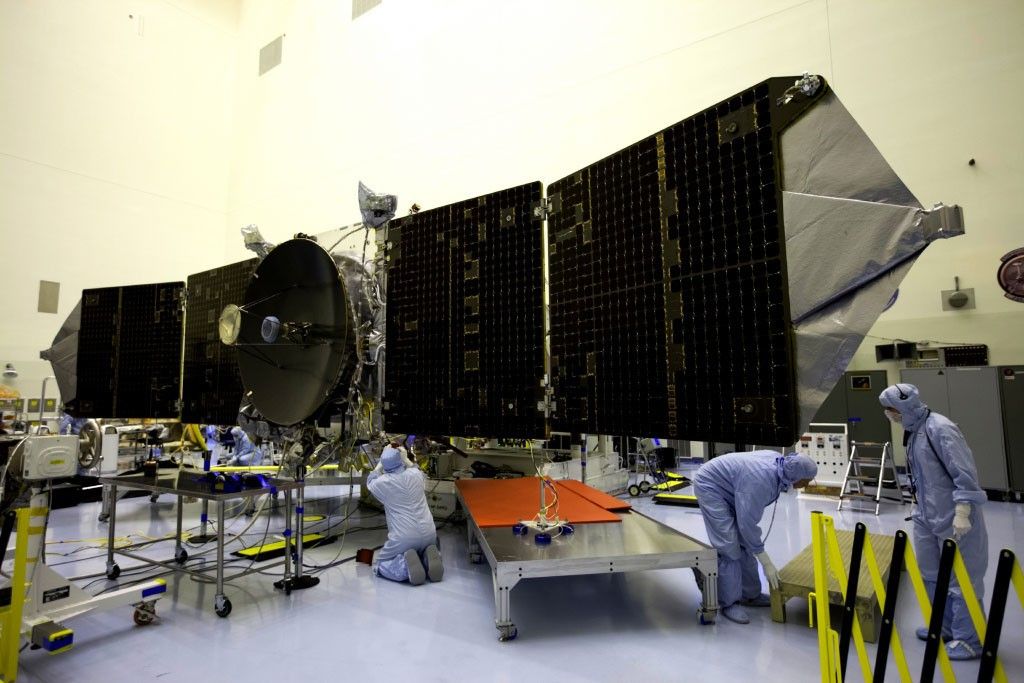 Test deployment of the solar panels on the MAVEN spacecraft. The magnetometers built by GSFC that are the primary source of data I use for my research are mounted on the ends of the solar panels.